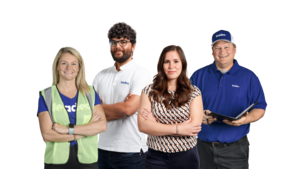 Group photo of diverse Leadec employees.