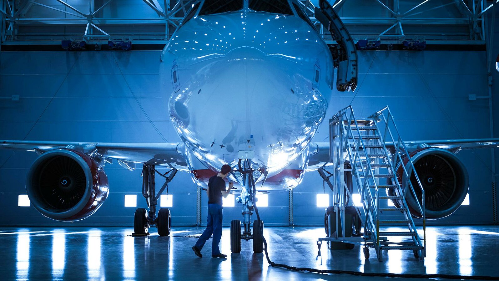 Airplane in a production hall.