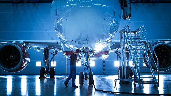 Airplane in a production hall.