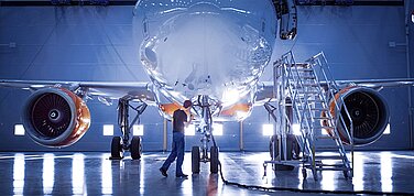 Airplane in a production hall.
