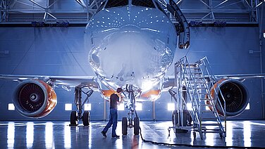 Airplane in a production hall.